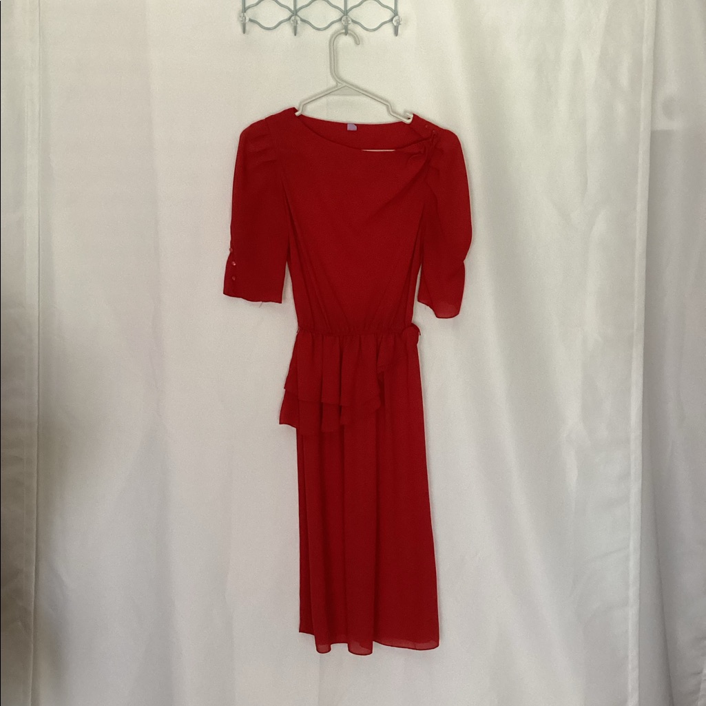 Bold Red Dress With Ruffles And Buttons On Sleeves